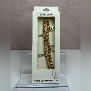 BaubleBar Gold Colored Beaded Phone Charm Wristlet